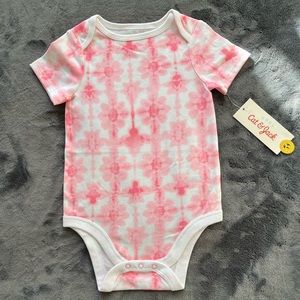 Tie-dyed baby girl onesie